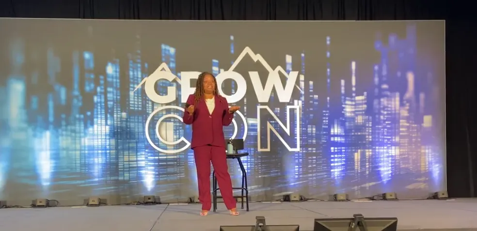 Michelle speaking on stage